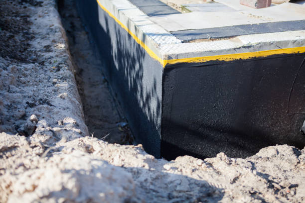 Professional Waterproofing technician working in Baldwin, MI